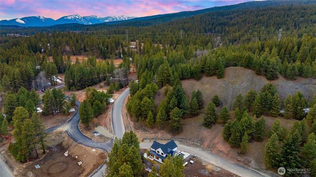 As the newest PNW master-planned community, enjoy 200+ acres of open space, trails & the Coal Trax Mt Bike Park. Soaring ceilings in the great roommake each day worthy of celebration & open floorplan appeals to entertaining. Covered deck & patio. Southern-facing homesites range from the mid600s- 900ks. Enjoy a variety of innovative & distinctive new home options with the best all-season recreation just moments away! Built for the future, indulge in a retreat just 90-min to Seattle. Plans and elevations are artist’s renderings only, may not accurately represent the actual condition of a home asconstructed and may also contain options and upgrades which are not included in the sale. Trailside Homes reserves the right to make changes to the floorplan, specifications, dimensions, design and elevations without prior notice. Stated dimensions and square footage are estimated and should not be usedas representations of the home’s actual size. | Image 16