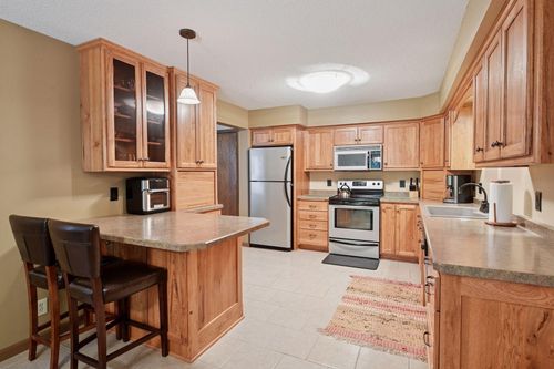 1648 Comstock Ln N, Plymouth, MN, 55447-2833 | Card Image