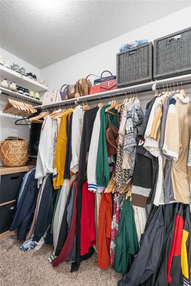walk-in primary closet. | Image 18