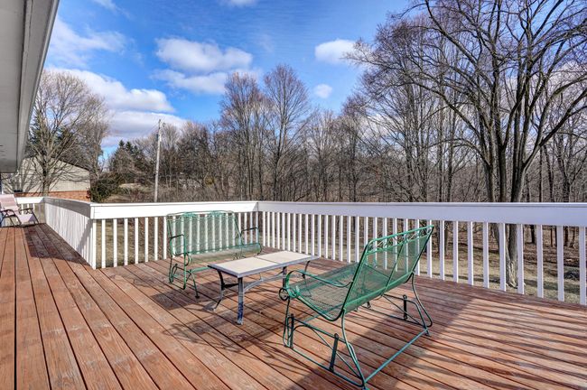 Deck access from living room and bedroom | Image 9