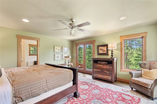 Primary Bedroom featuring multiple windows, recessed lighting, a ceiling fan, and access to outside | Image 33