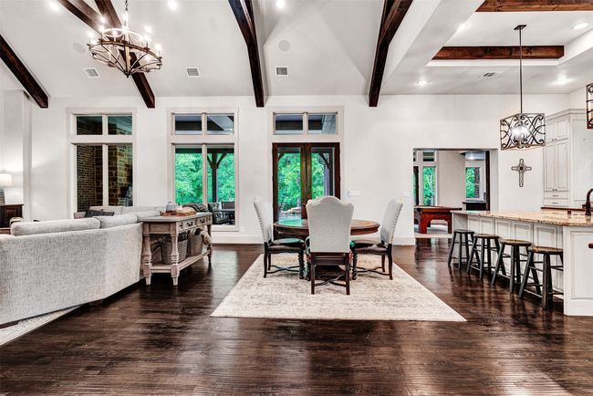 This fabulous breakfast space is part of the main living area, so completely flexible in how you use it! Maybe you don't need another table with the large seating area at the island. You decide! | Image 9