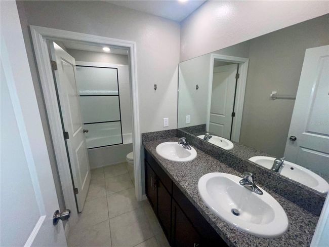9520 Lemon Drop Loop, House other with 6 bedrooms, 3 bathrooms and null parking in SUN CITY CENTER FL | Image 15