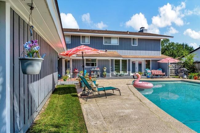 Another view of the pool and backyard area. | Image 44