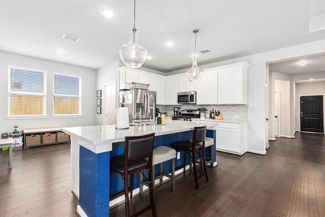 Eat a hearty breakfast at your kitchen island while conversing with your family | Image 8