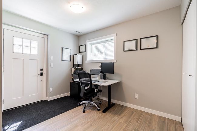 Home office with plenty of natural light, baseboards, and light wood-style floors | Image 28