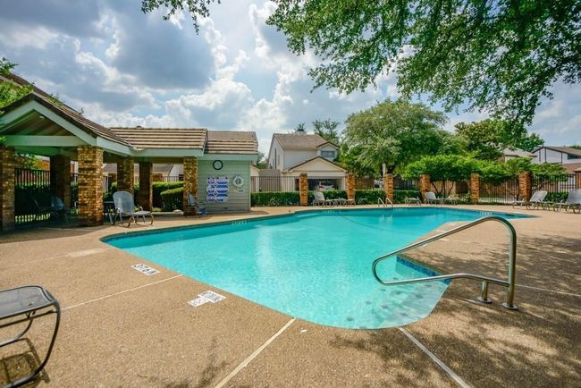 Community pool featuring a patio area | Image 25