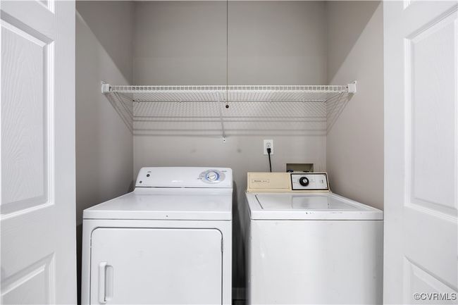 Laundry room featuring independent washer and dryer | Image 23