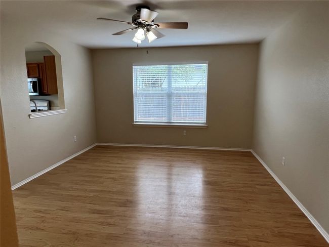 Family room with Fan and hard surface flooring | Image 4