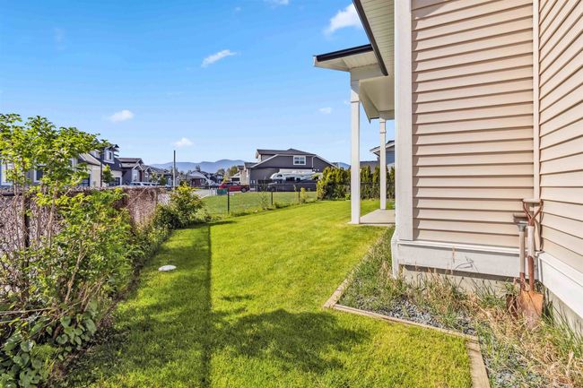 View of yard featuring fence and a residential view | Image 10
