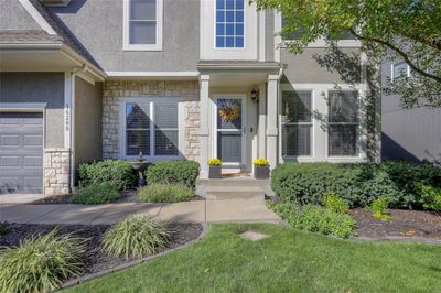 Lovely stone accents and a beautiful running fountain welcome you home. | Image 3