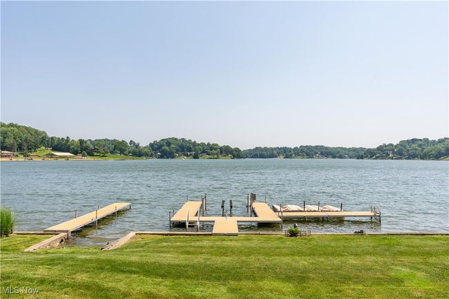 Dock area featuring a water view and a yard | Image 17