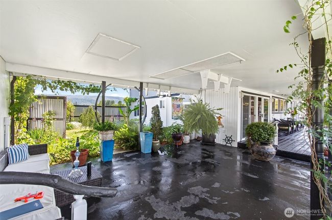 Breezeway from back deck of house into all shops. Great for getting out of the sun and relaxing | Image 7