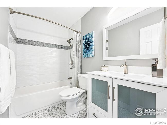 two tranquil bedrooms (one with an ensuite bath), plus a full hall bath, create flex space for guests, office, or multi-gen livin | Image 11