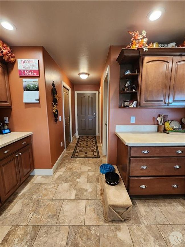 Kitchen looking toward laundry room and garage | Image 14