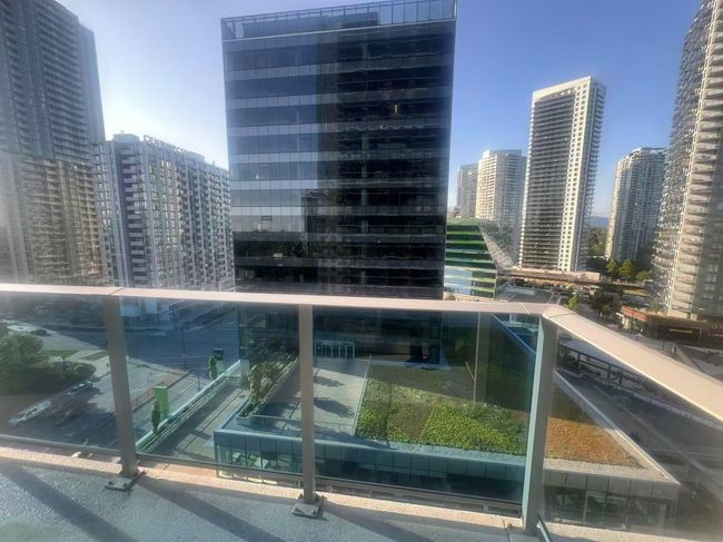 Balcony featuring a city view | Image 8