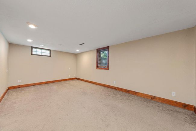Lower-level family room with Egress window if one would like to add another bedroom | Image 28