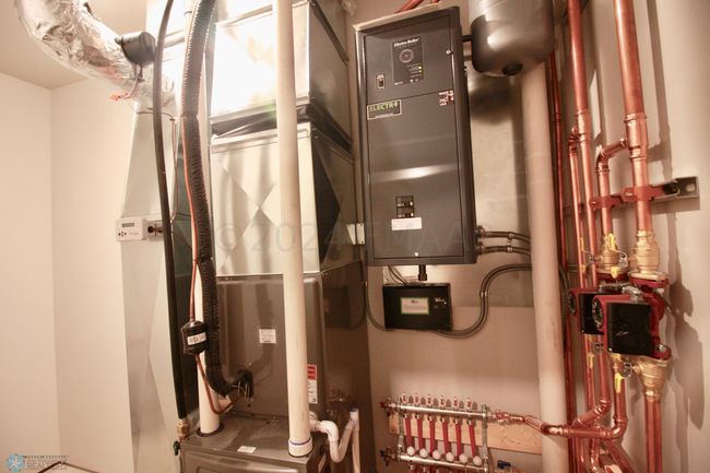 Utility/furnace room in the garage | Image 45
