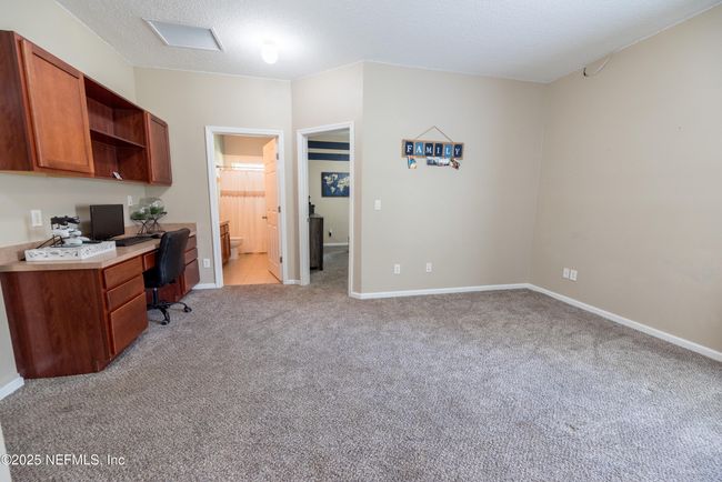 11760 Huckleberry Trl E, House other with 4 bedrooms, 2 bathrooms and null parking in MACCLENNY FL | Image 28