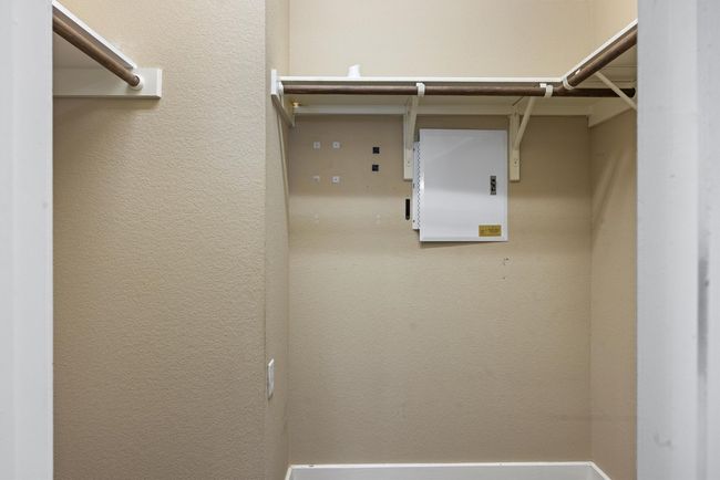 Large walk in primary closet | Image 36