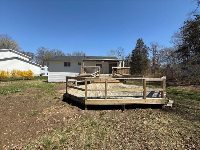 Rear view of house with a deck | Image 23