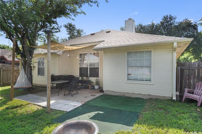 Back of house with an extended patio | Image 23