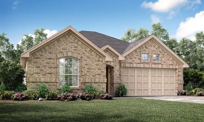 View of front of property featuring a garage and a front lawn | Image 1