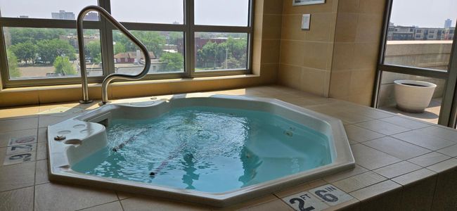 9-indoor hot tub with view of skyline & amenities.jpg | Image 10