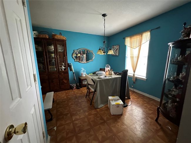 Dining area with baseboards | Image 4
