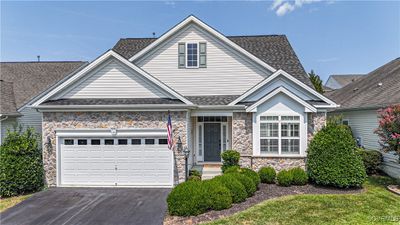 View of front of home featuring a garage | Image 2