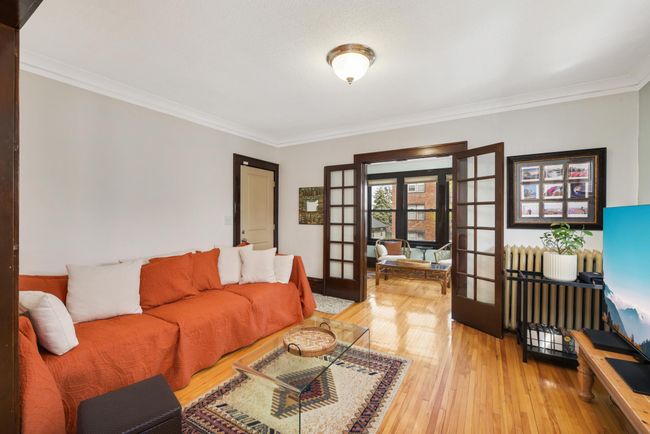 Upon entry into this beautiful condo, you will instantly notice the elegance and old world craftsmanship of the woodwork throughout. | Image 5