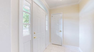 Greet your guests in your foyer with tile under foot. | Image 2