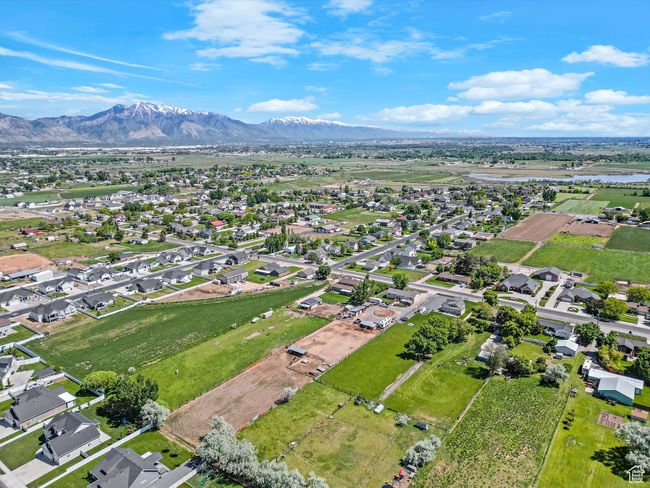 View of property location featuring a mountain backdrop and nearby suburban area | Image 52