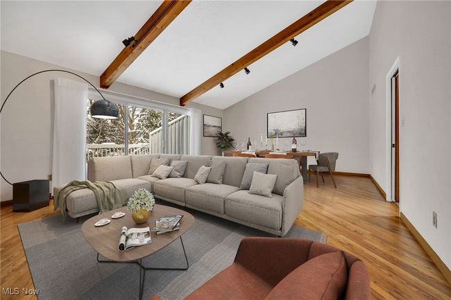 Virtually staged great room area looking other direction | Image 12