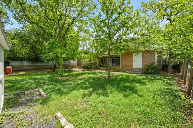 The spacious yard offers ideal shade for the hot summer months! | Image 24