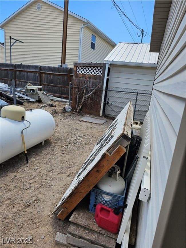 View of yard featuring fence | Image 30