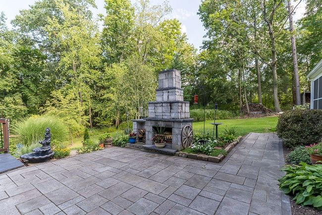 Outdoor patio w/brick fireplace | Image 20