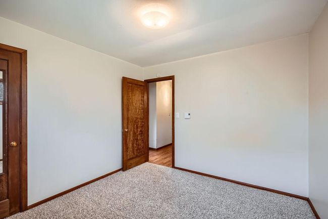 Bedroom with nice wood doors | Image 18