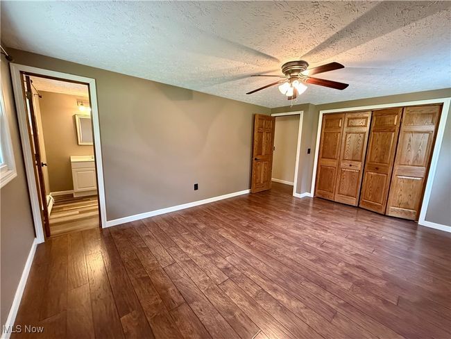 Owner bedroom showing access to bathroom | Image 21