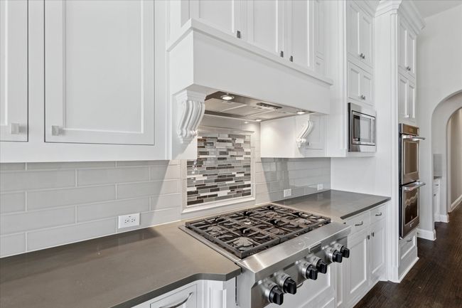 Kitchen also has a gas stove and built-in microwave | Image 14