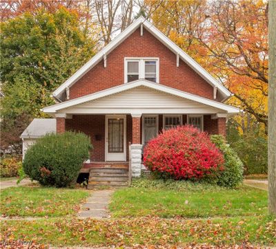 View of front of house featuring a front yard and covered porch | Image 2