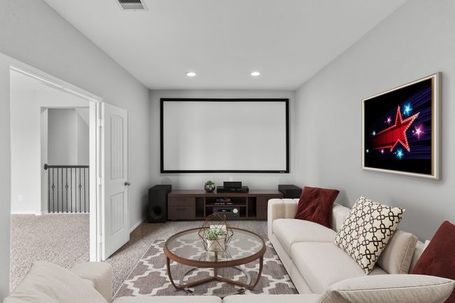 Virtually Staged: No need to go to the movie theater with this fantastic media room! It is complete with plush carpet and recessed lighting. | Image 19