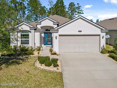 143 N Coopers Hawk Way, House other with 4 bedrooms, 2 bathrooms and null parking in Palm Coast FL | Image 1