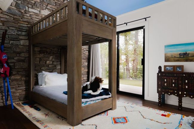 Bedroom featuring wood finished floors and access to outside | Image 26