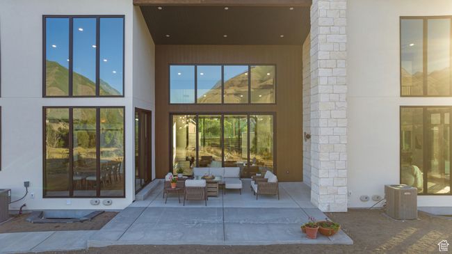 Entrance to property with outdoor lounge area and a patio area | Image 90