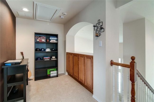 Hall featuring light carpet | Image 8