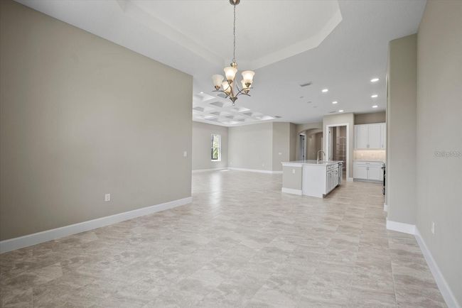 View toward kitchen from dining area | Image 20