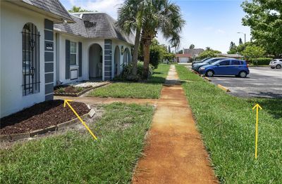 Front door and parking space | Image 3