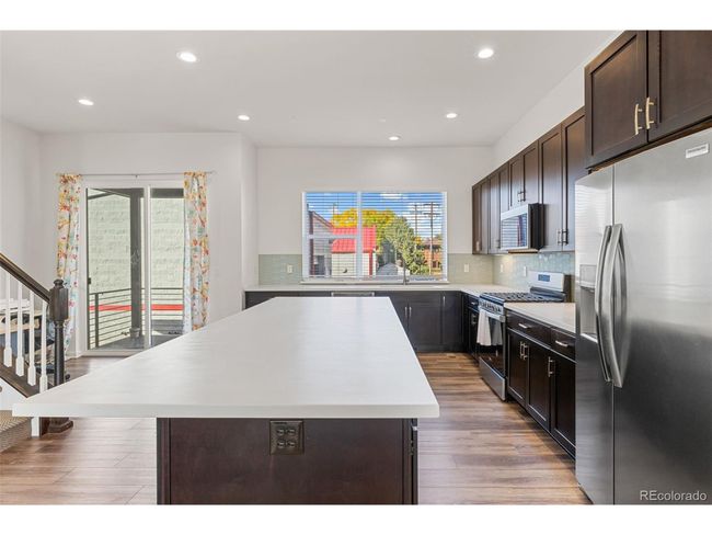 5173 Vivian St, Townhouse with 4 bedrooms, 3 bathrooms and null parking in Wheat Ridge CO | Image 15
