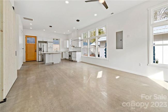Open floor plan with Radiant heated concrete floors. | Image 6
